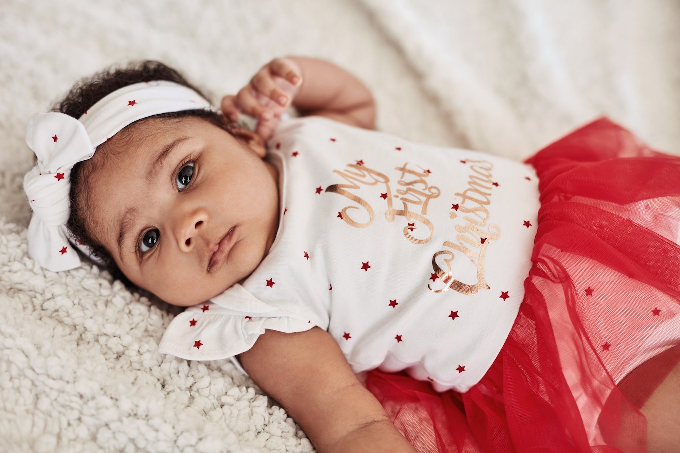 baby girl in a Christmas outfit