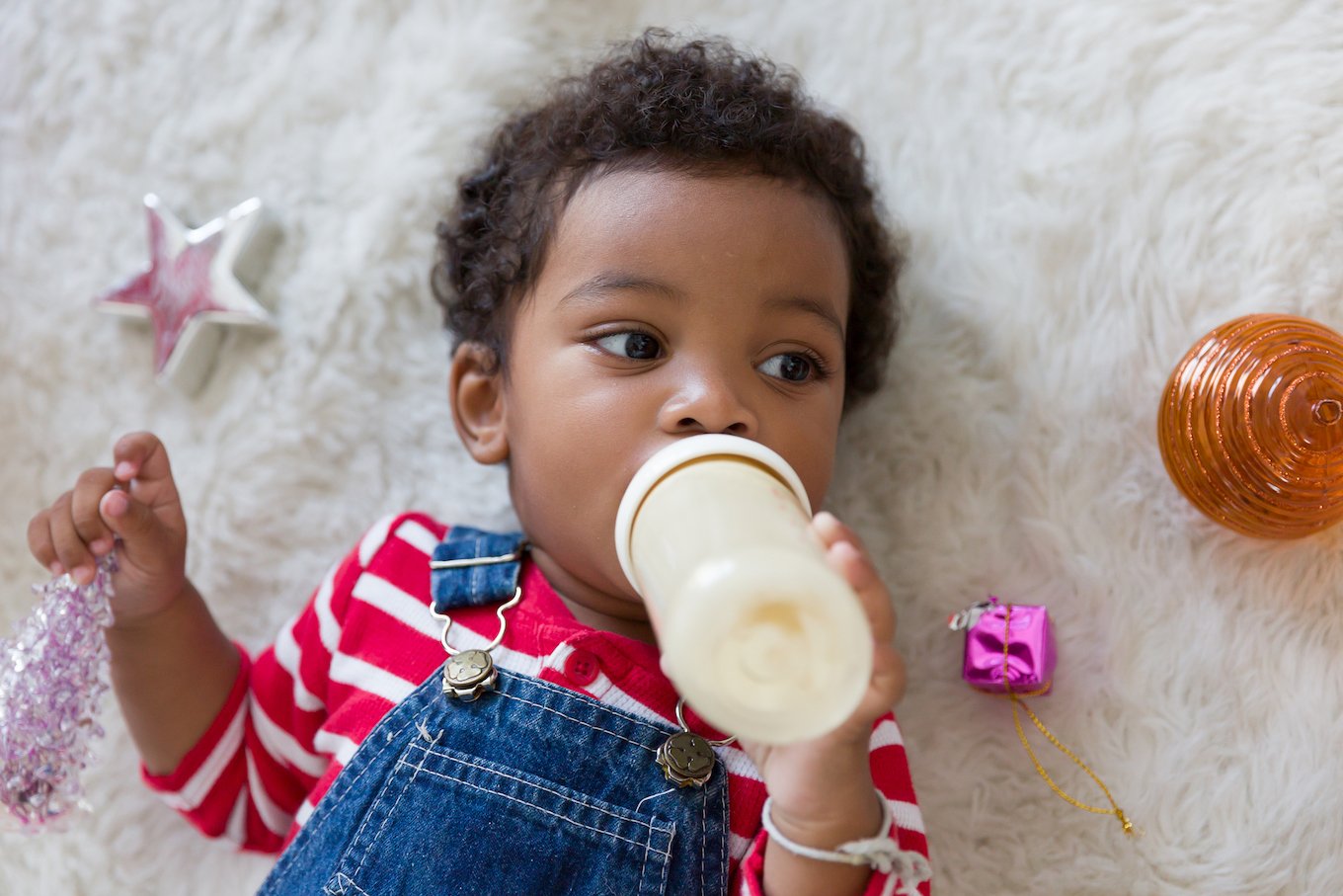 Baby boy with a bottle