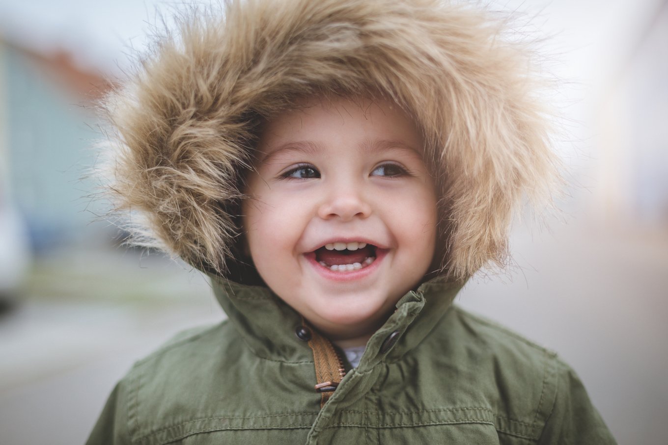 Child in a fur hood